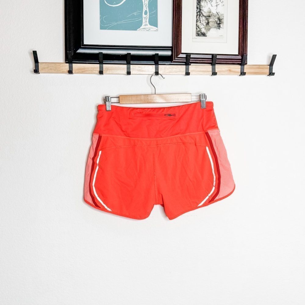 Athleta Bright Orange Running Shorts w/Back Zip Pocket & Reflective Trim Size M - Picture 3 of 9